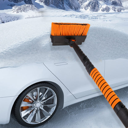 Clearing snow from a car bonnet