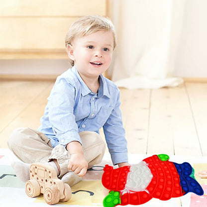 Child playing with the Santa push-pop fidget